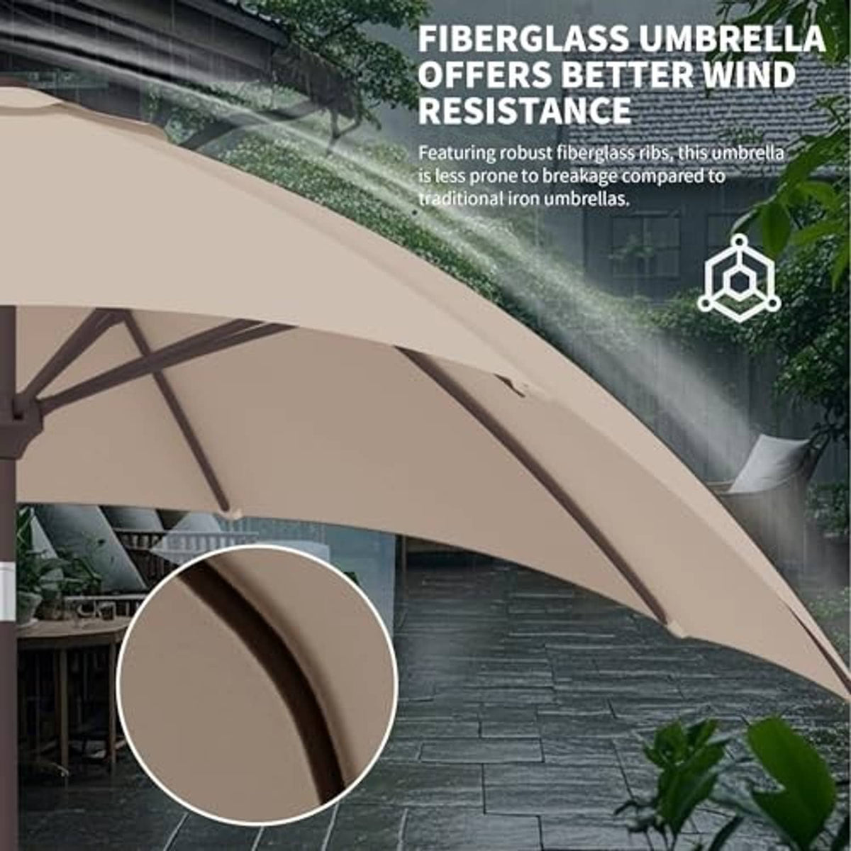 Beige umbrella canopy with fabric edge trim and metal rib spokes at the hub
