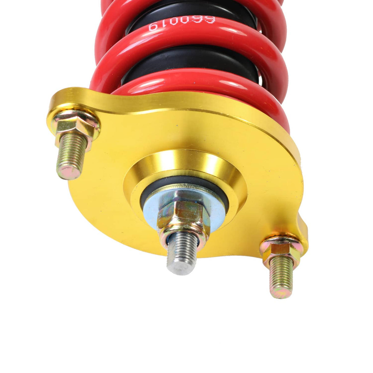 Close-up of adjustable coilover strut spring seat: gold cap and red spring