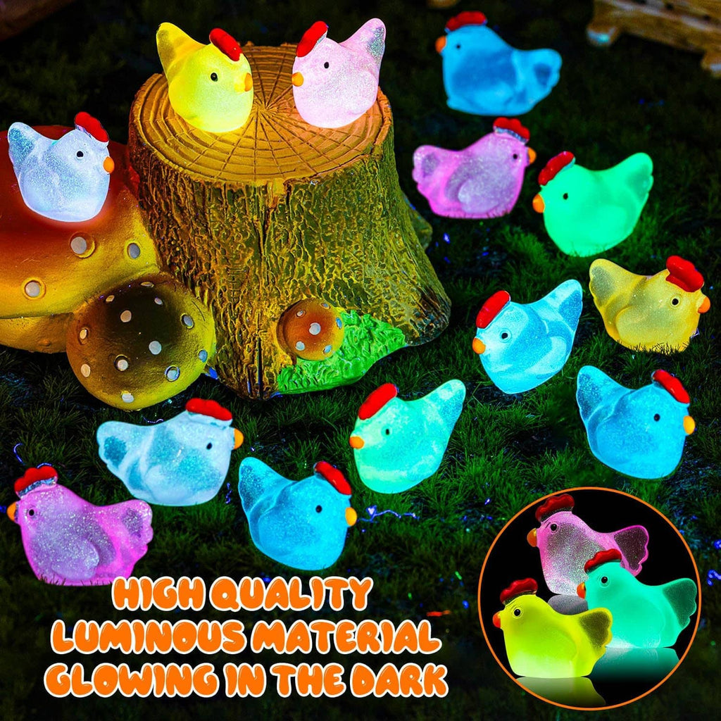 Glowing luminous chicken figurines on grass at night, multicolor small animal figures