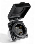Flanged TT-30P RV power inlet plug with black cover open, showing round outlet.
