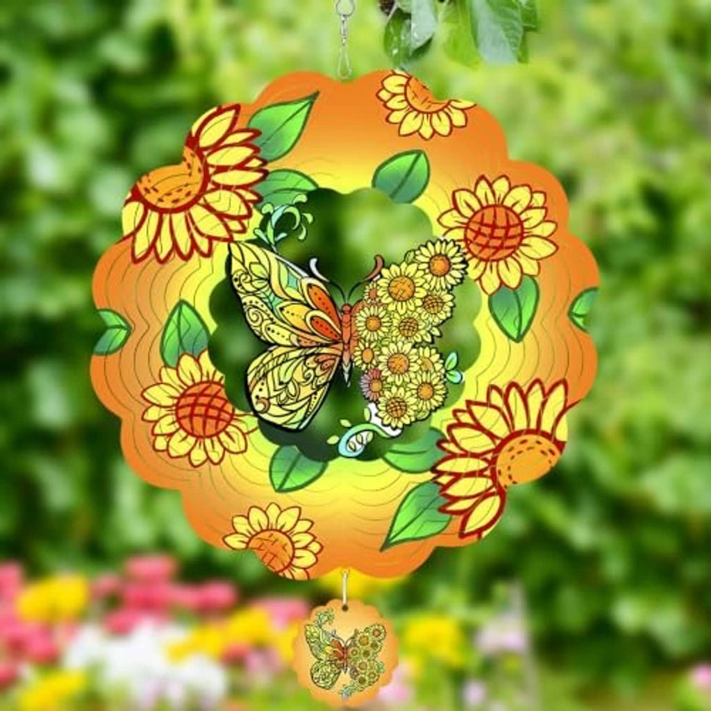 Colorful 3D butterfly wind spinner with orange floral petals, green leaves, and dangling charm