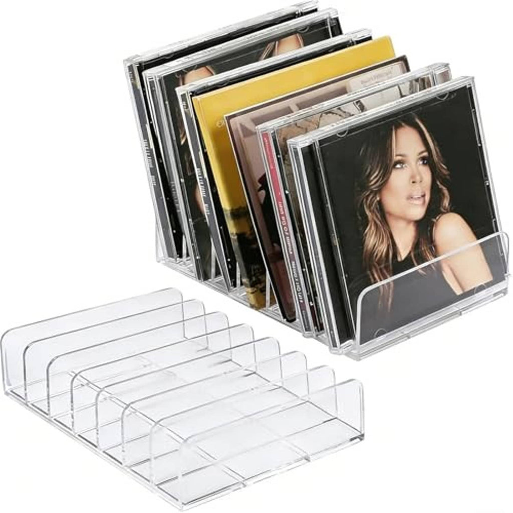 Clear acrylic CD organizer set with 7-slot trays, displaying CDs in individual slots