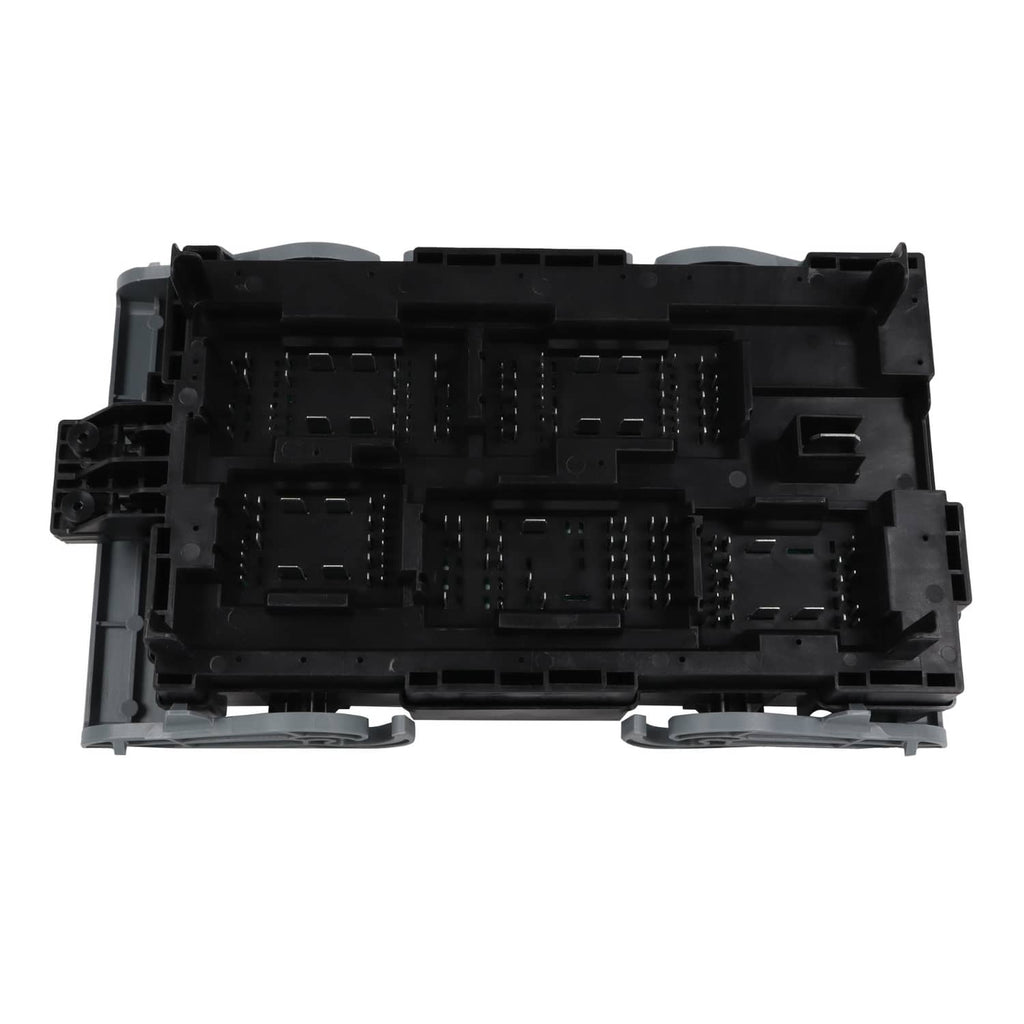 Vehicle fuse relay junction block rear view with multiple empty relay/switch sockets