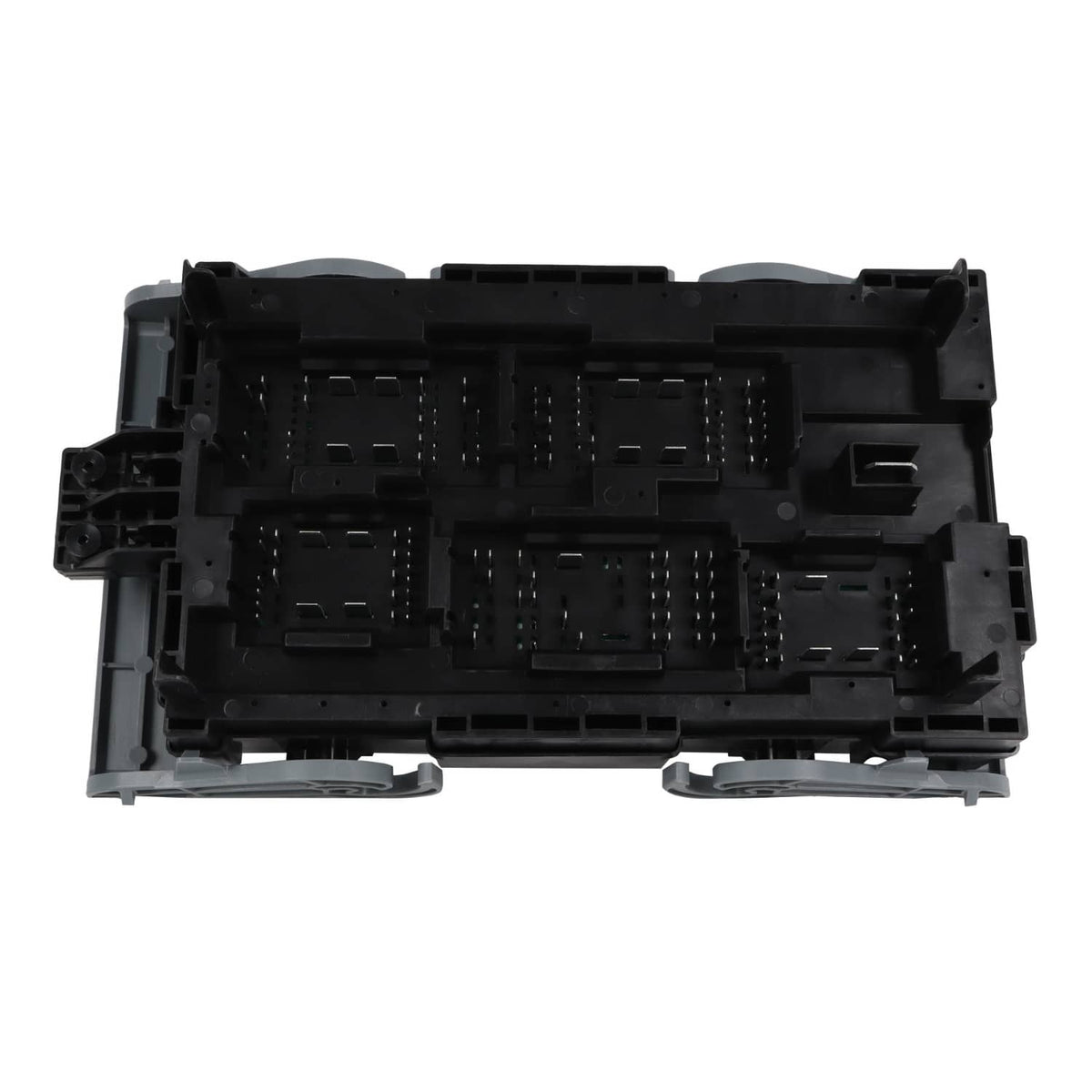 Vehicle fuse relay junction block rear view with multiple empty relay/switch sockets