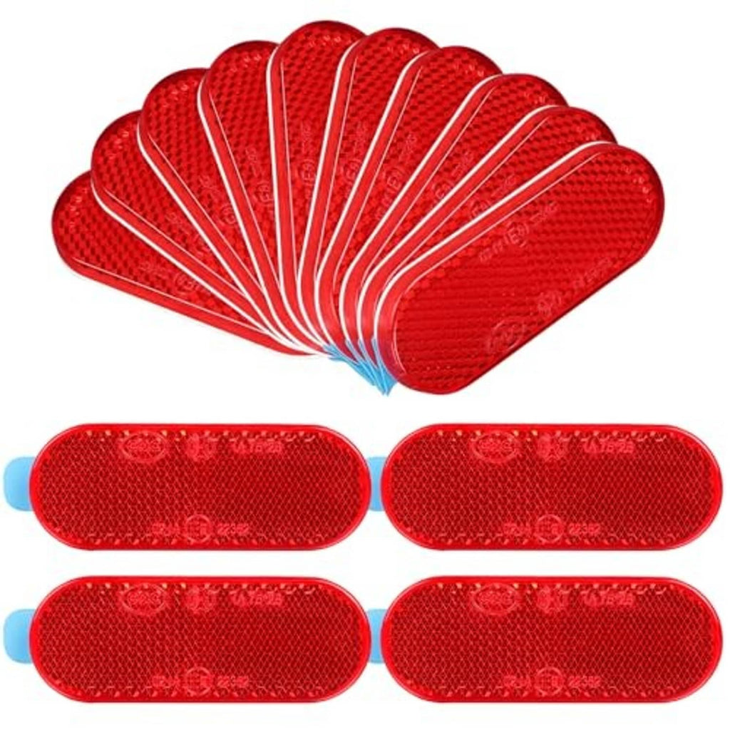 10 red oval reflector stickers fanned out, self-adhesive with blue backing tabs