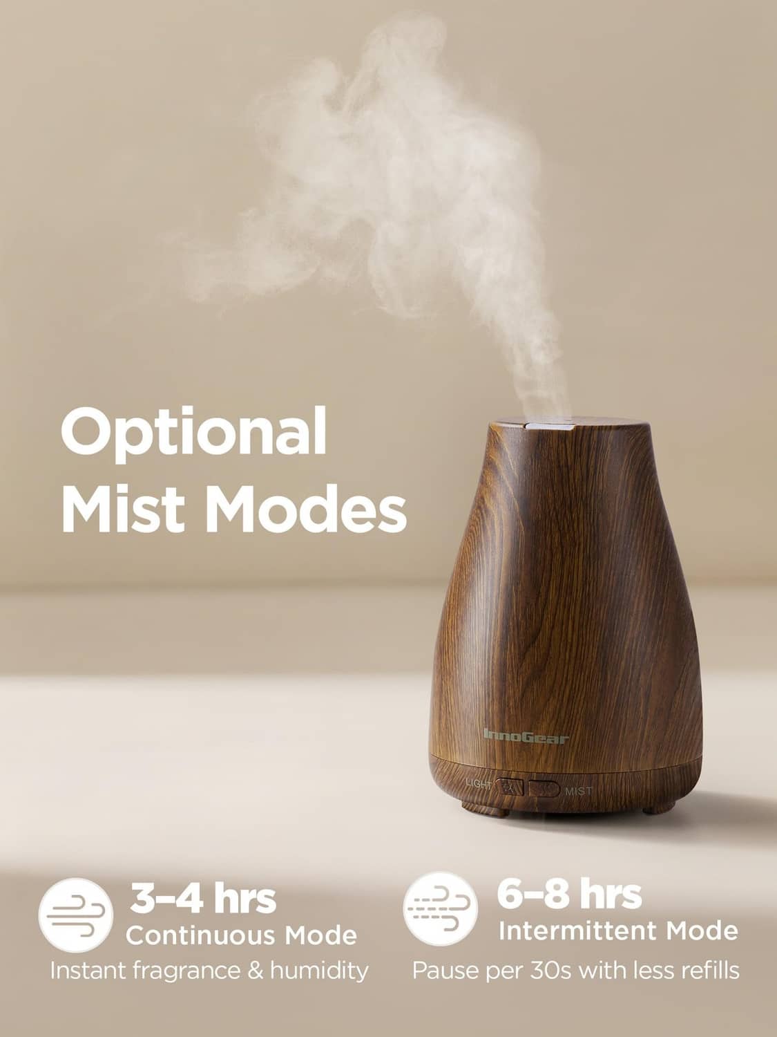 Bronze wood-grain essential oil diffuser emitting a steady mist plume from the top vent