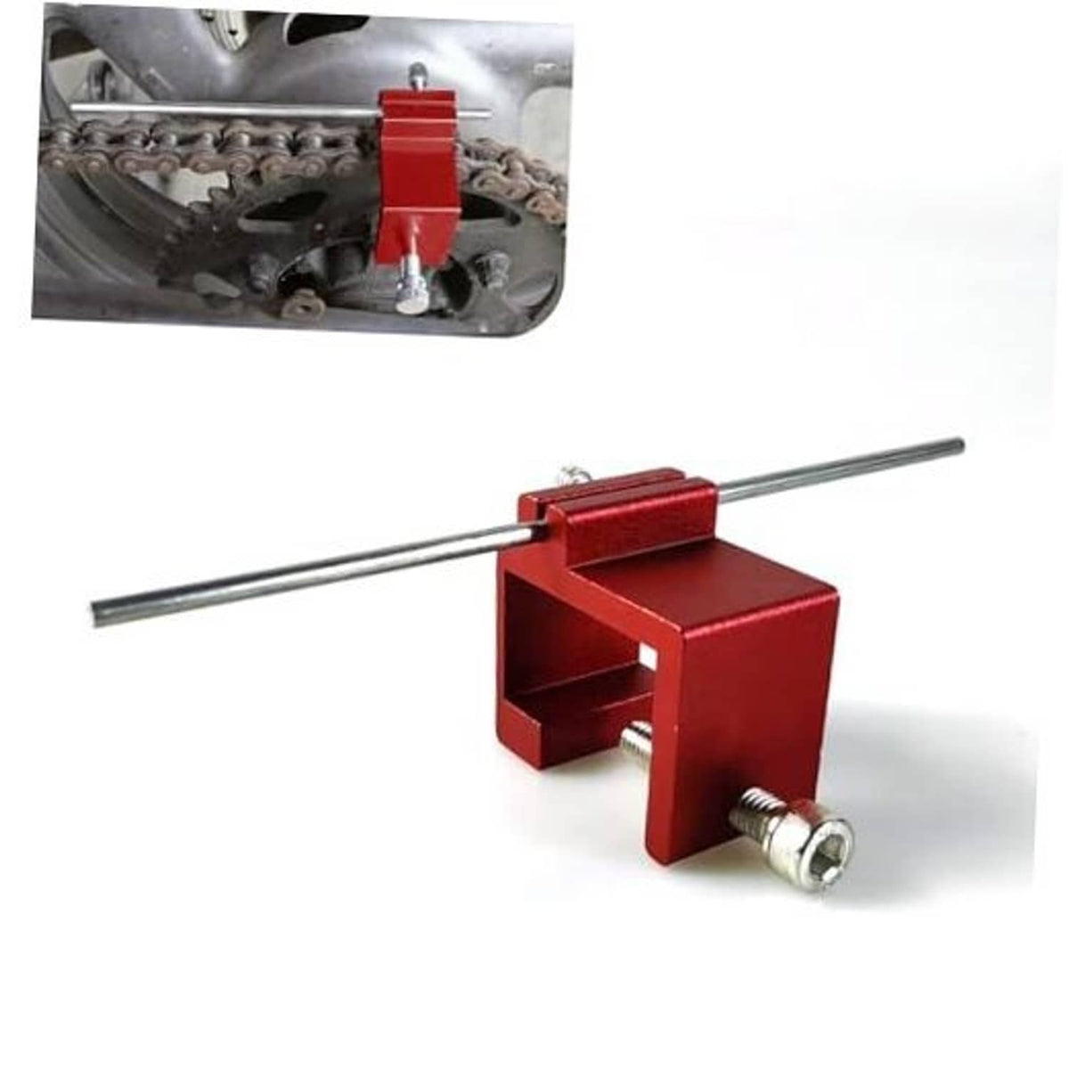Red chain alignment tool with silver bar and screw clamp near motorcycle chain
