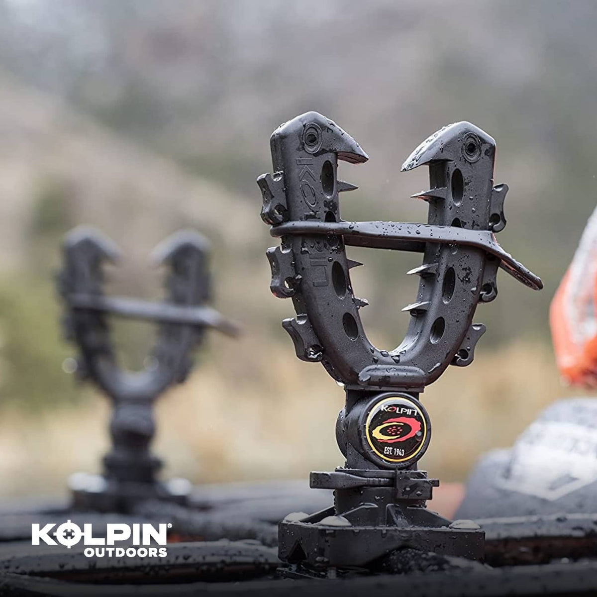 Black rotating gear mounting clamp on heavy-duty base for outdoor use