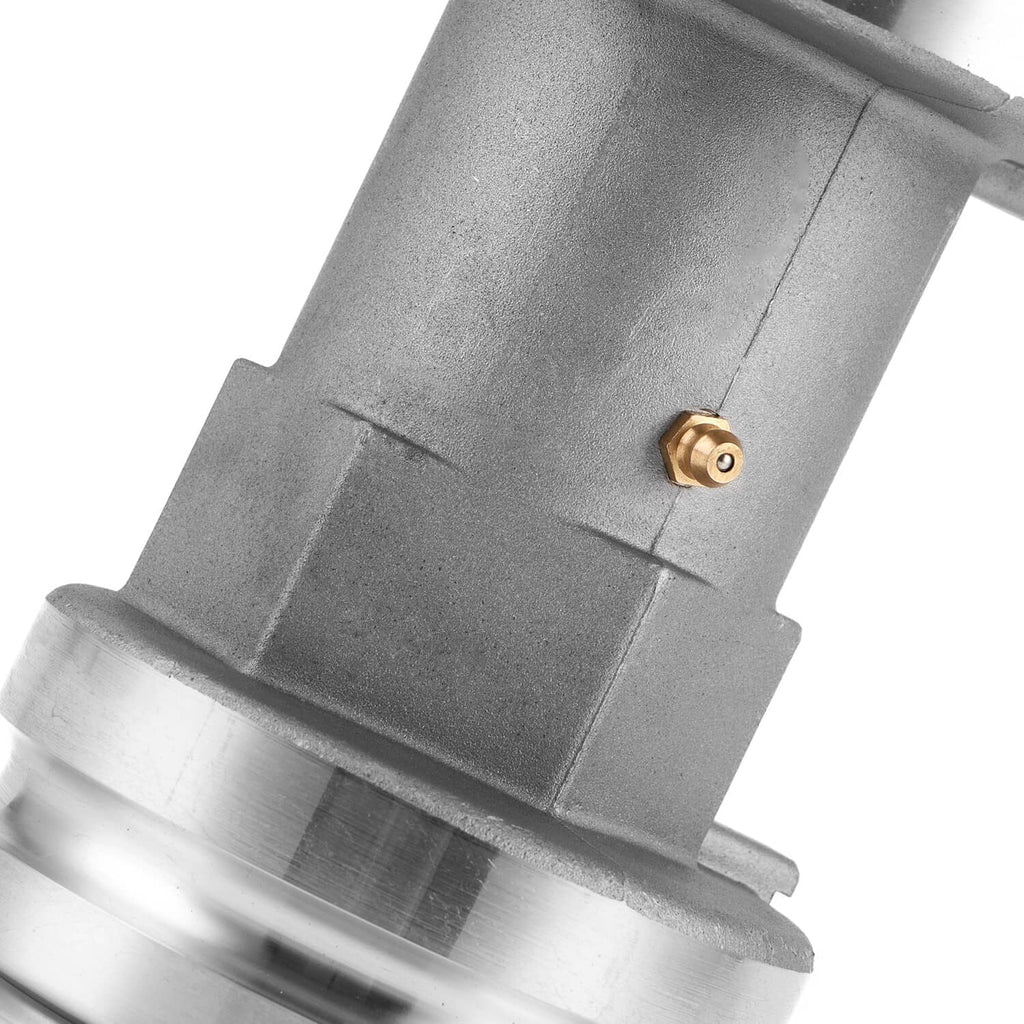 Rear axle bearing housing carrier hub close-up of gray housing and brass fastener