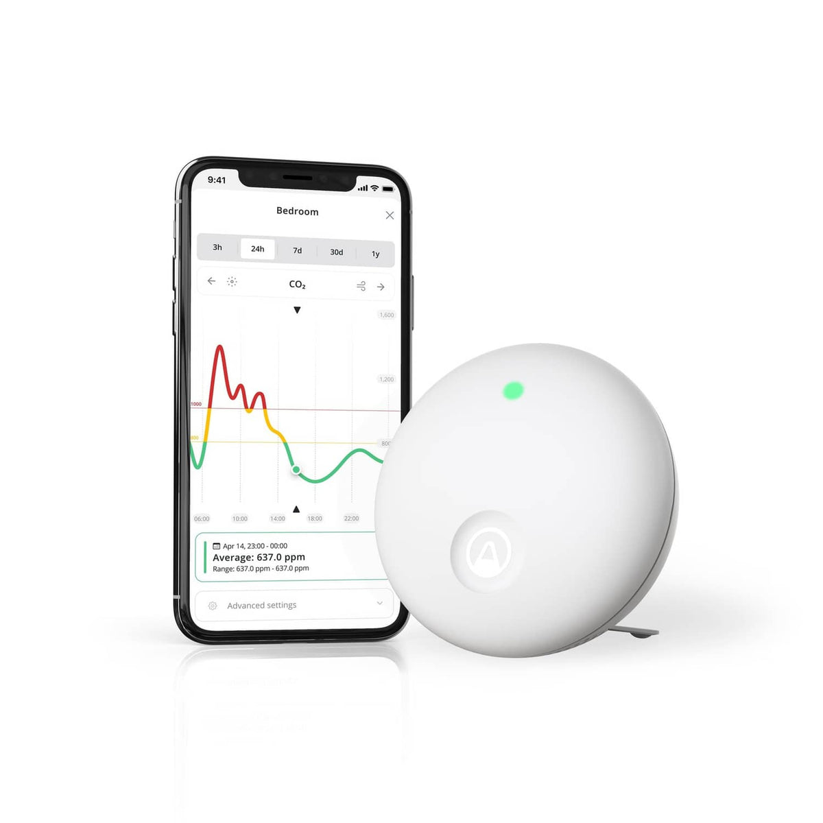 Airthings Wave Enhance white indoor air quality monitor with green status light