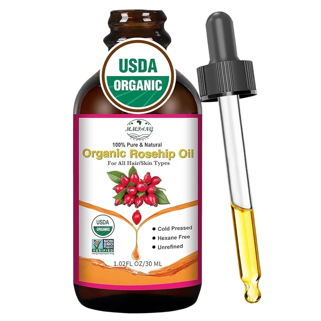 Organic rosehip seed oil bottle with dropper, amber oil in glass vial.