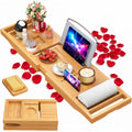 Beige bamboo foldable bathtub caddy tray with compartments for cups, phone, and candle