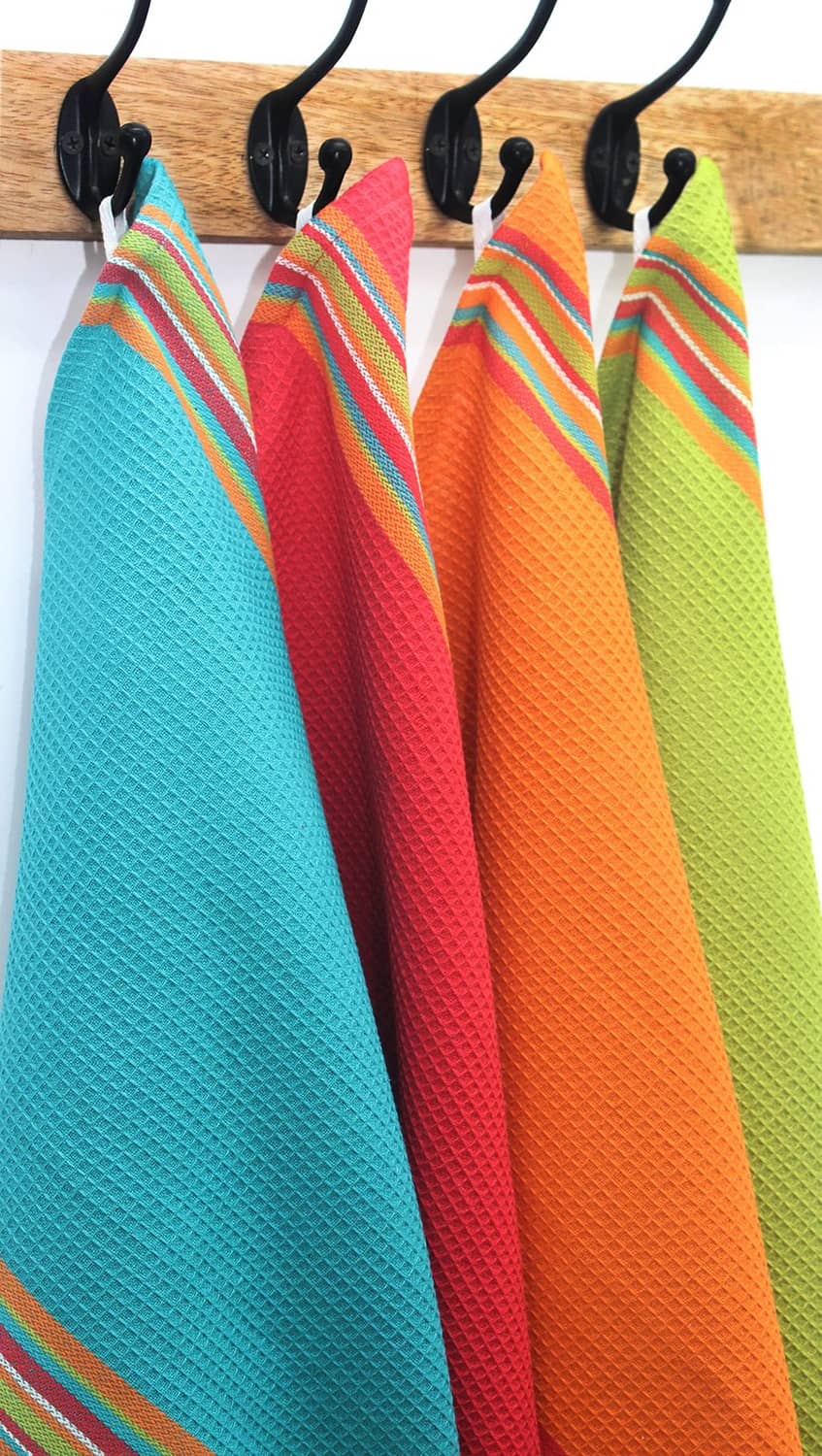 Hanging striped cotton kitchen towels on hooks, teal, red, orange, and green