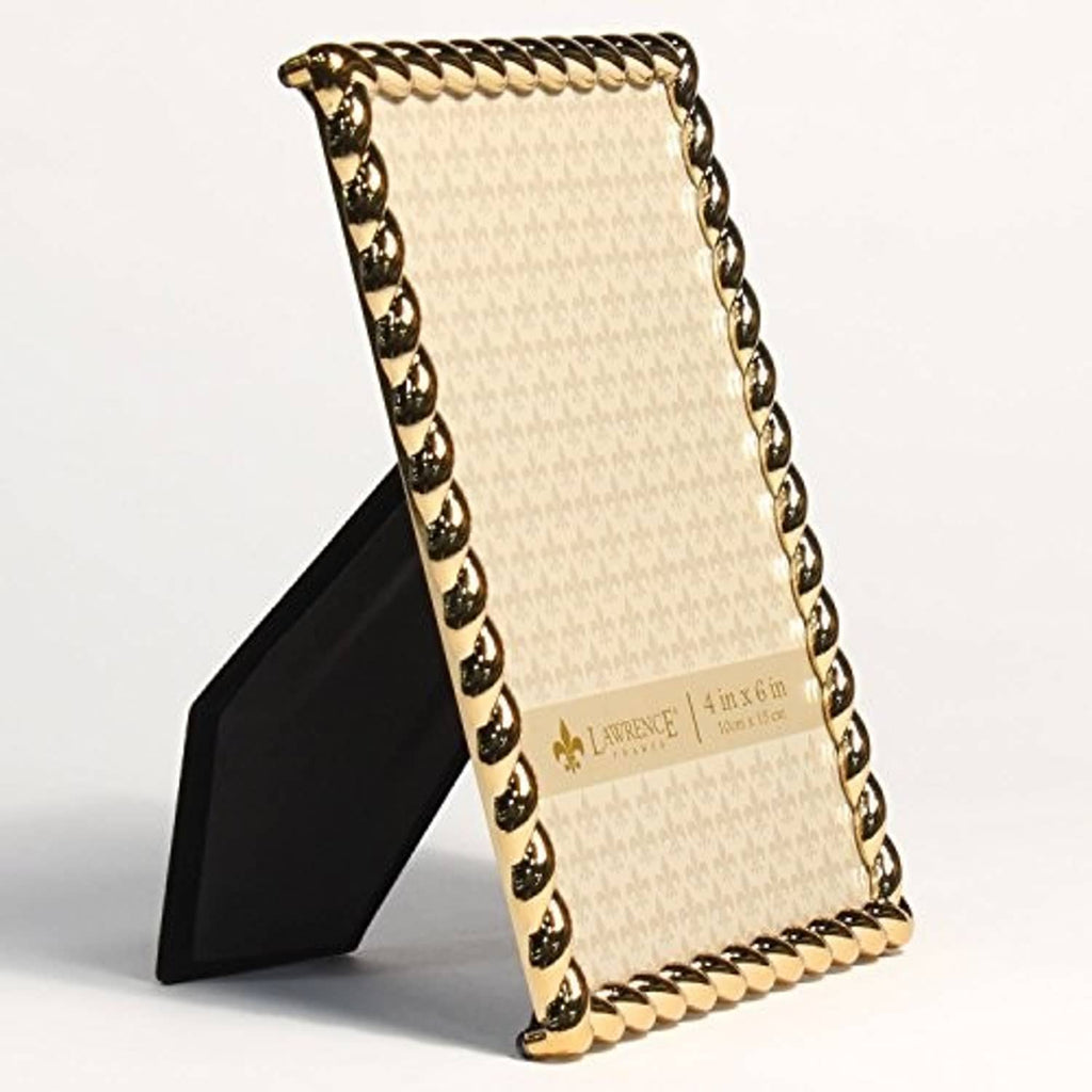 Gold rope-design metal photo frame with beige mat, standing on black easel.