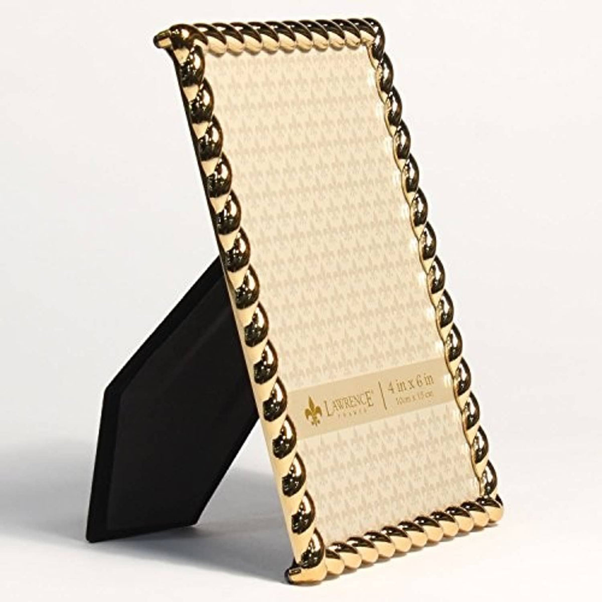 Gold rope-design metal photo frame with beige mat, standing on black easel.