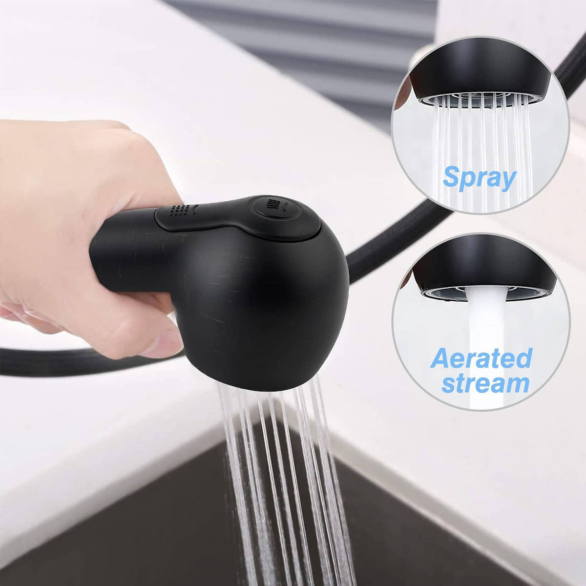 Black sprayer head producing a vertical water spray stream