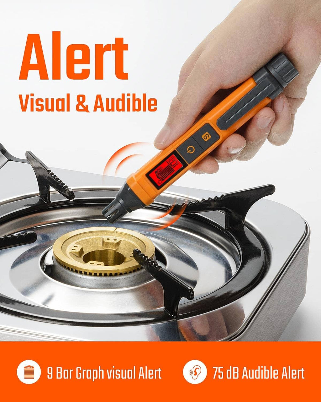 Orange gas leak detector held over a gas stove with LCD screen visible.