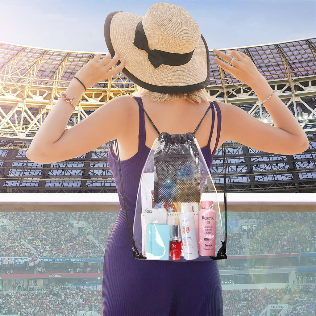 Clear drawstring bag with black top, worn over shoulder, holding small bottles and phone