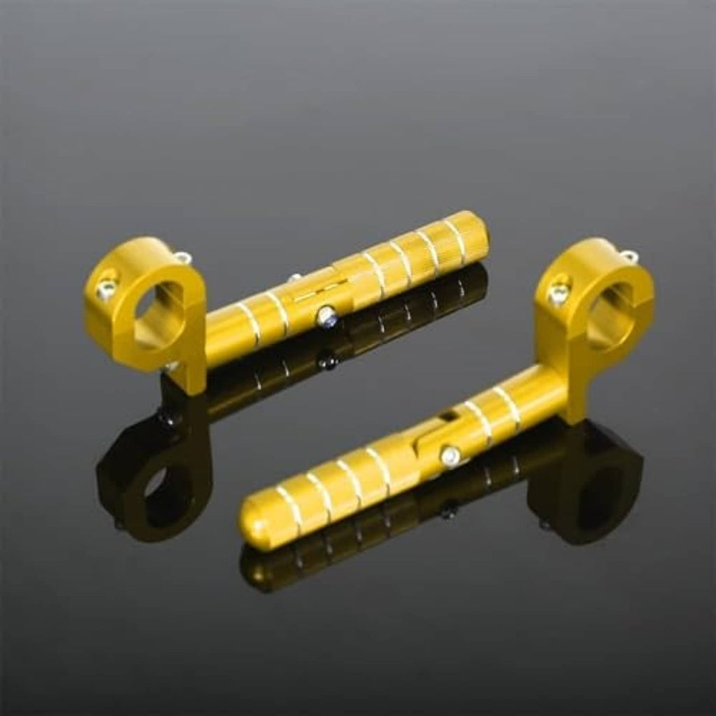 Gold folding rear passenger footrest pegs with textured silver grip sleeves