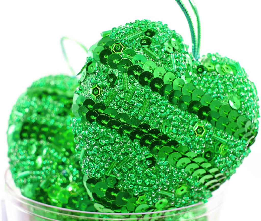 Bright green beaded charm with glittery sequin-like surface