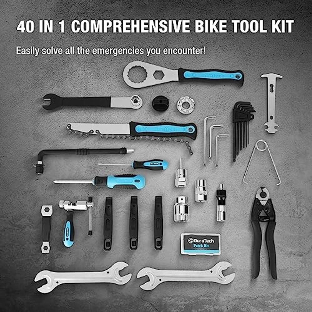 Bike tool kit set laid out: wrenches, pliers, screwdrivers, sockets, and tools