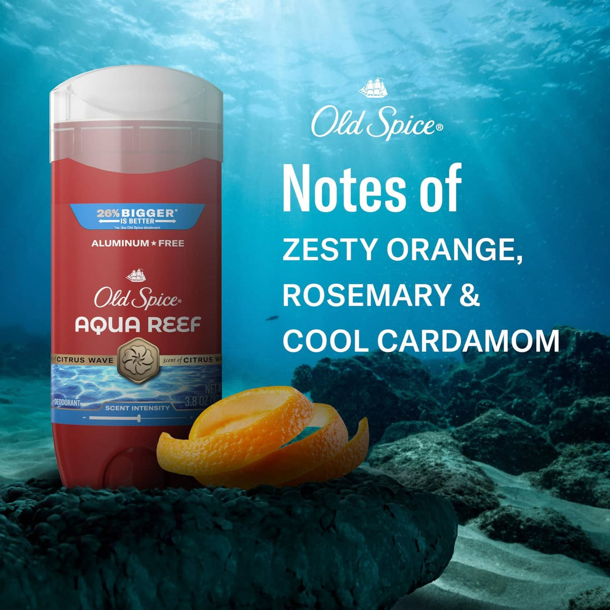 Old Spice Aqua Reef deodorant stick beside citrus fruit, red container with clear cap.