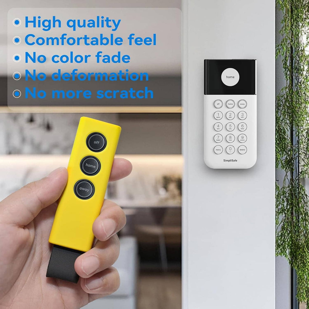 Yellow silicone key fob cover held in hand with three black button covers
