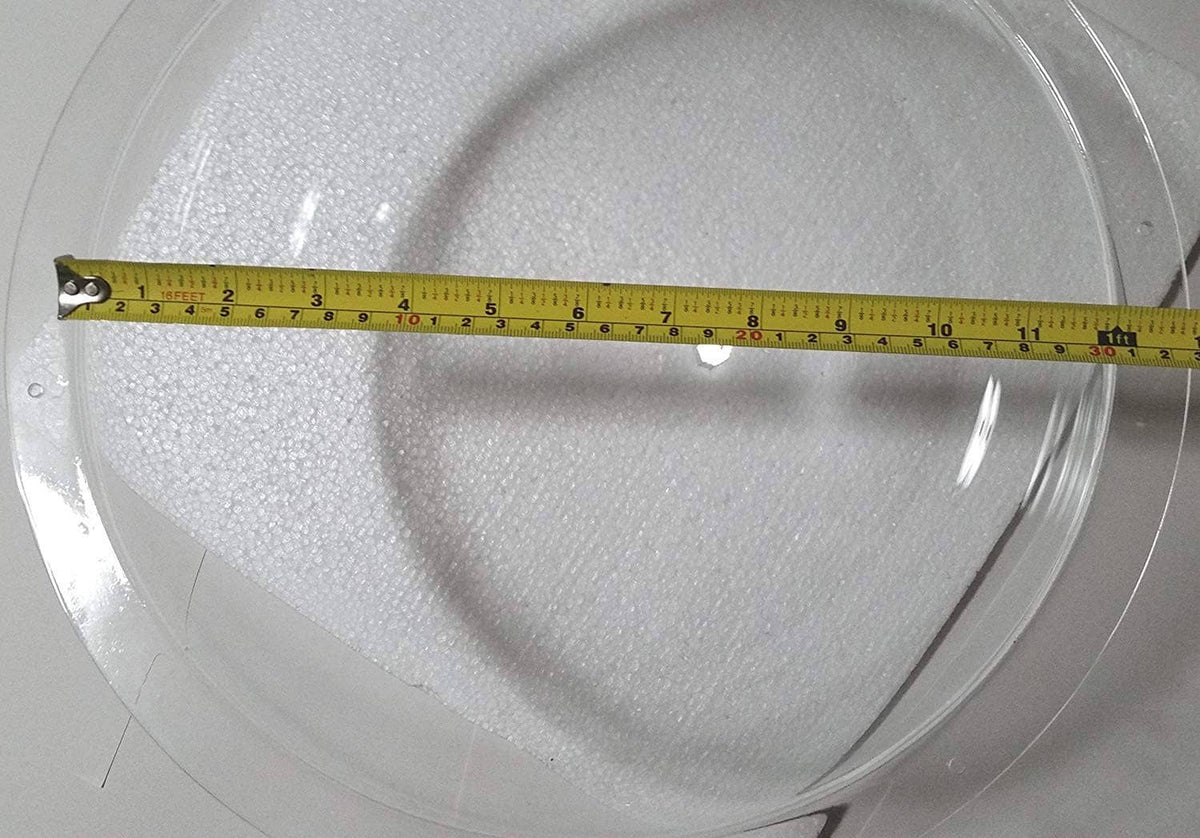 Clear acrylic dome hemisphere with tape measure across diameter.