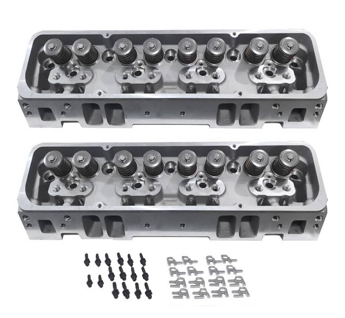 Two aluminum cylinder heads with installed valve springs and hardware bolts