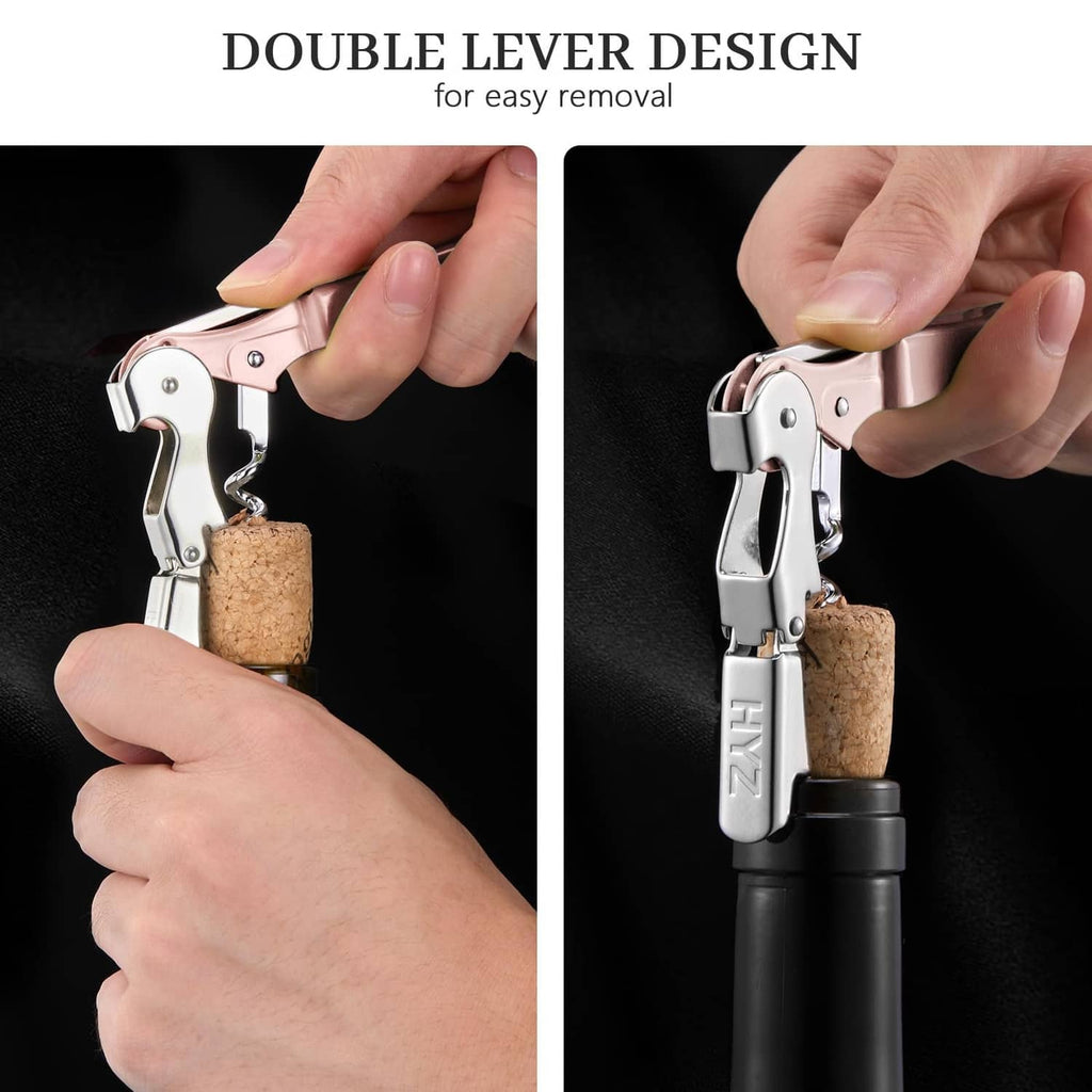 Pink and silver waiter corkscrew key removing a cork with two levers
