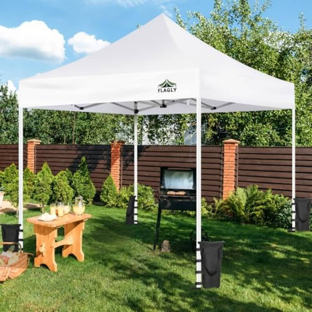 White pop-up canopy replacement top with attached corner weight bags and legs