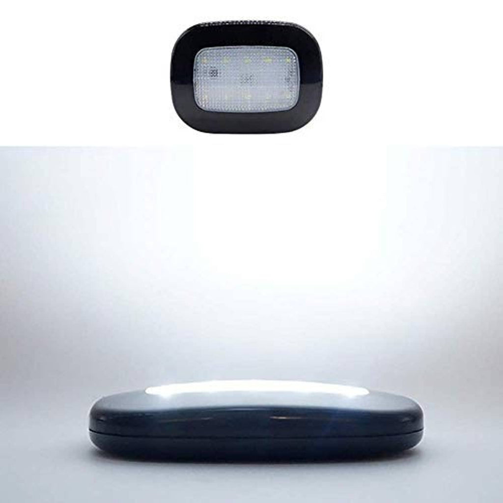 Rectangular LED car dome light with dark bezel, mounted on a vehicle ceiling