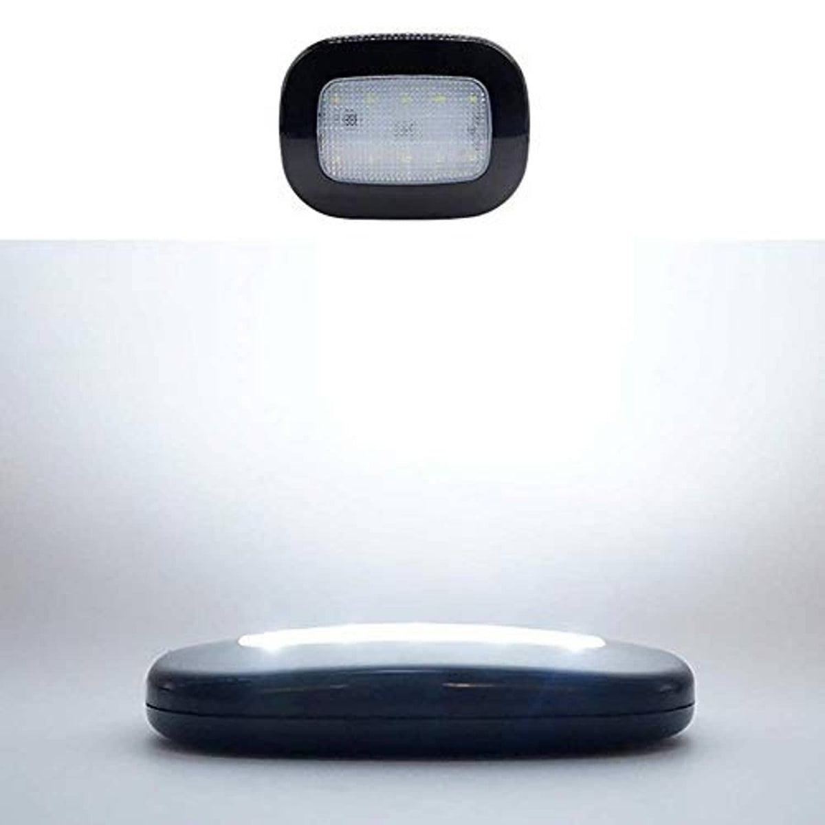 Rectangular LED car dome light with dark bezel, mounted on a vehicle ceiling