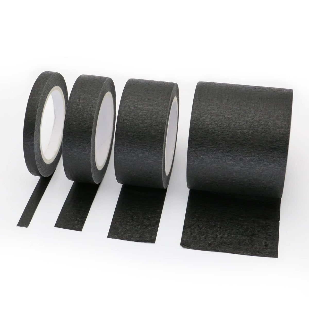 Black painters masking tape rolls with loose strip ends