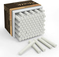 White chalk sticks packed in carton with multiple chalk sticks in foreground