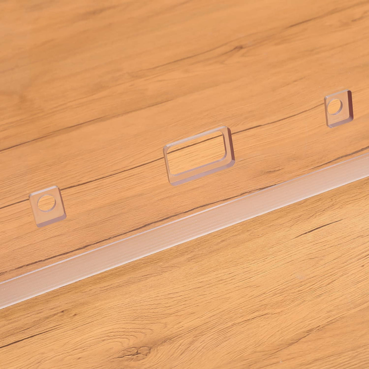 Close-up of door glass window mounting slots and square fastener openings