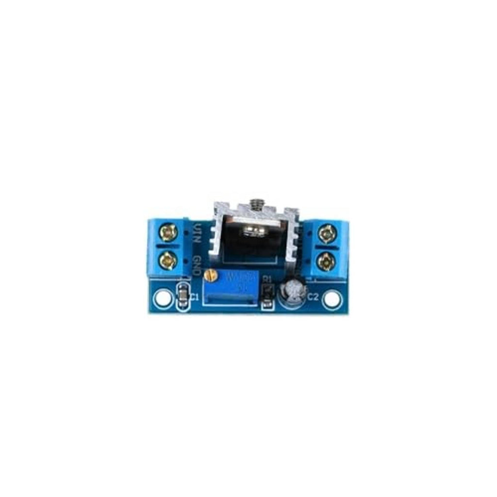 LM317 regulator module PCB with blue terminals and black regulator IC