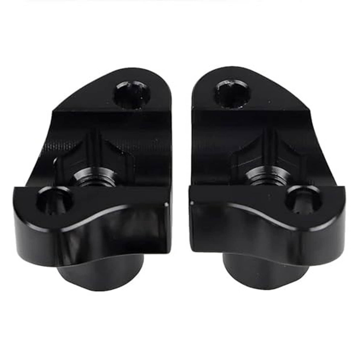 Black CNC handlebar risers with machined clamp grooves and threaded mounting holes