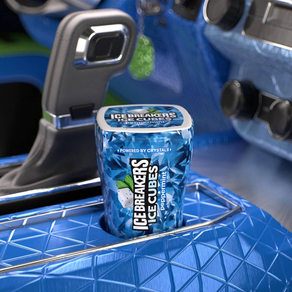 Peppermint sugar-free gum bottle on blue tray, label reads powered by crystals