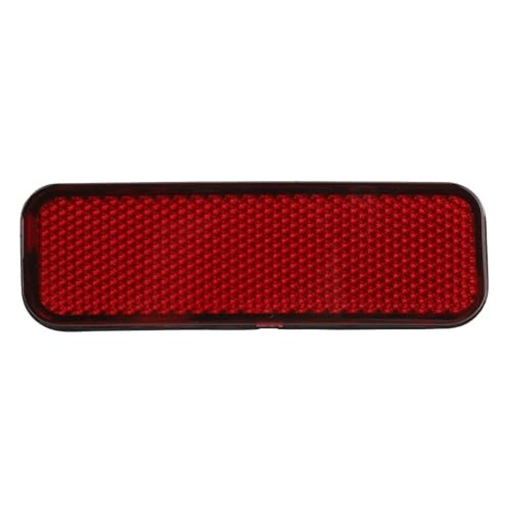 Red rear bumper reflector with textured lens and dark border, horizontal rectangular