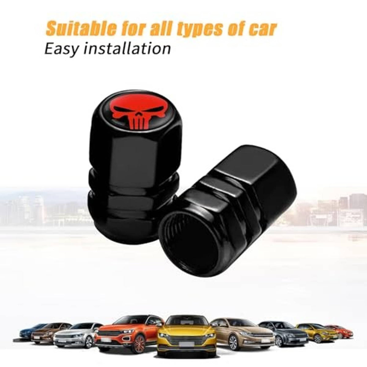 Pair of black tire valve stem caps with red skull emblem, angled side view