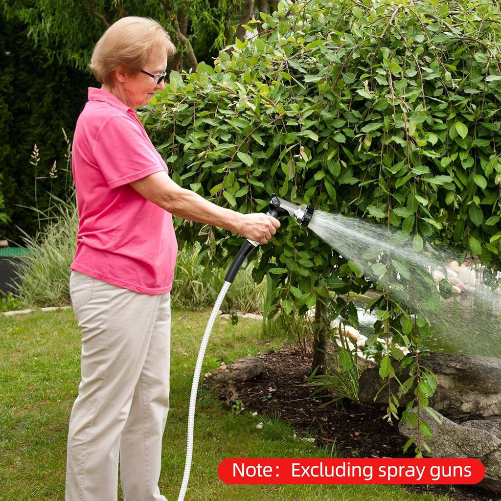 Stainless steel garden hose spraying water with brass connector and flexible metal coil