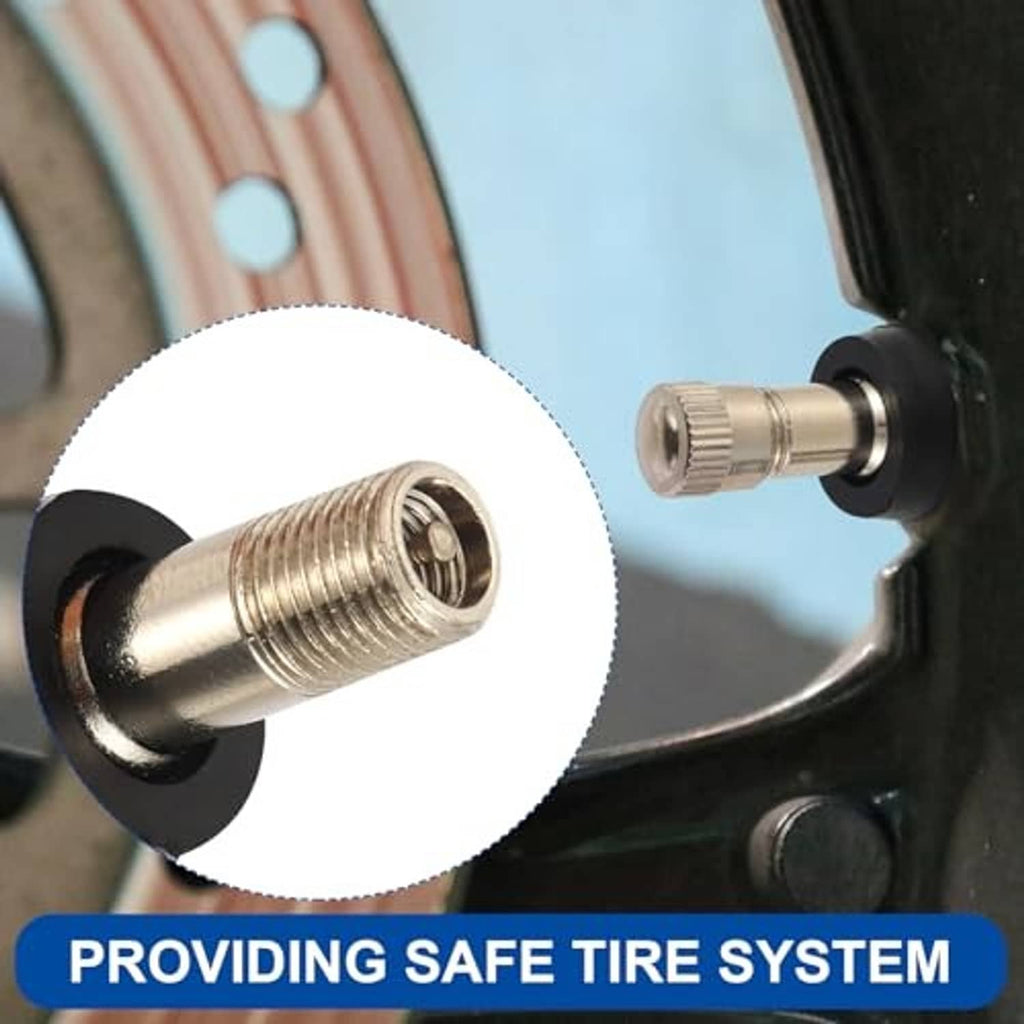 Brass tire valve stem installed on wheel rim with black rubber base