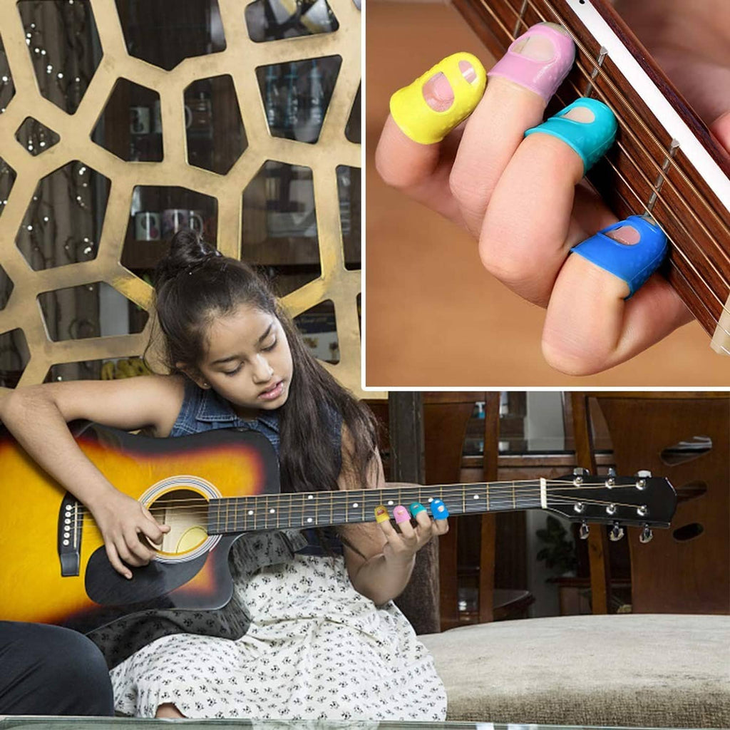Silicone guitar finger guards on a guitarist’s fingers while playing an acoustic guitar
