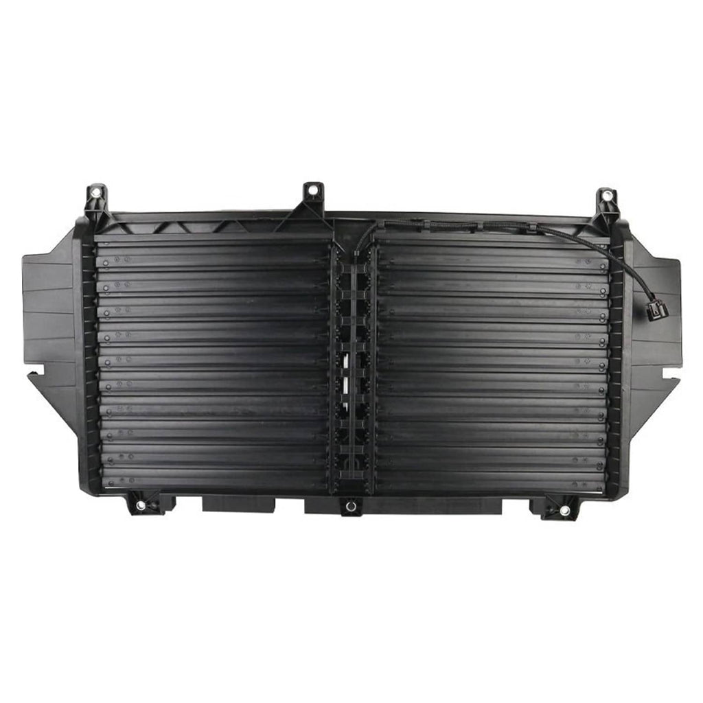 Grille shutter louver assembly with black housing, silver slats, and top wiring harness