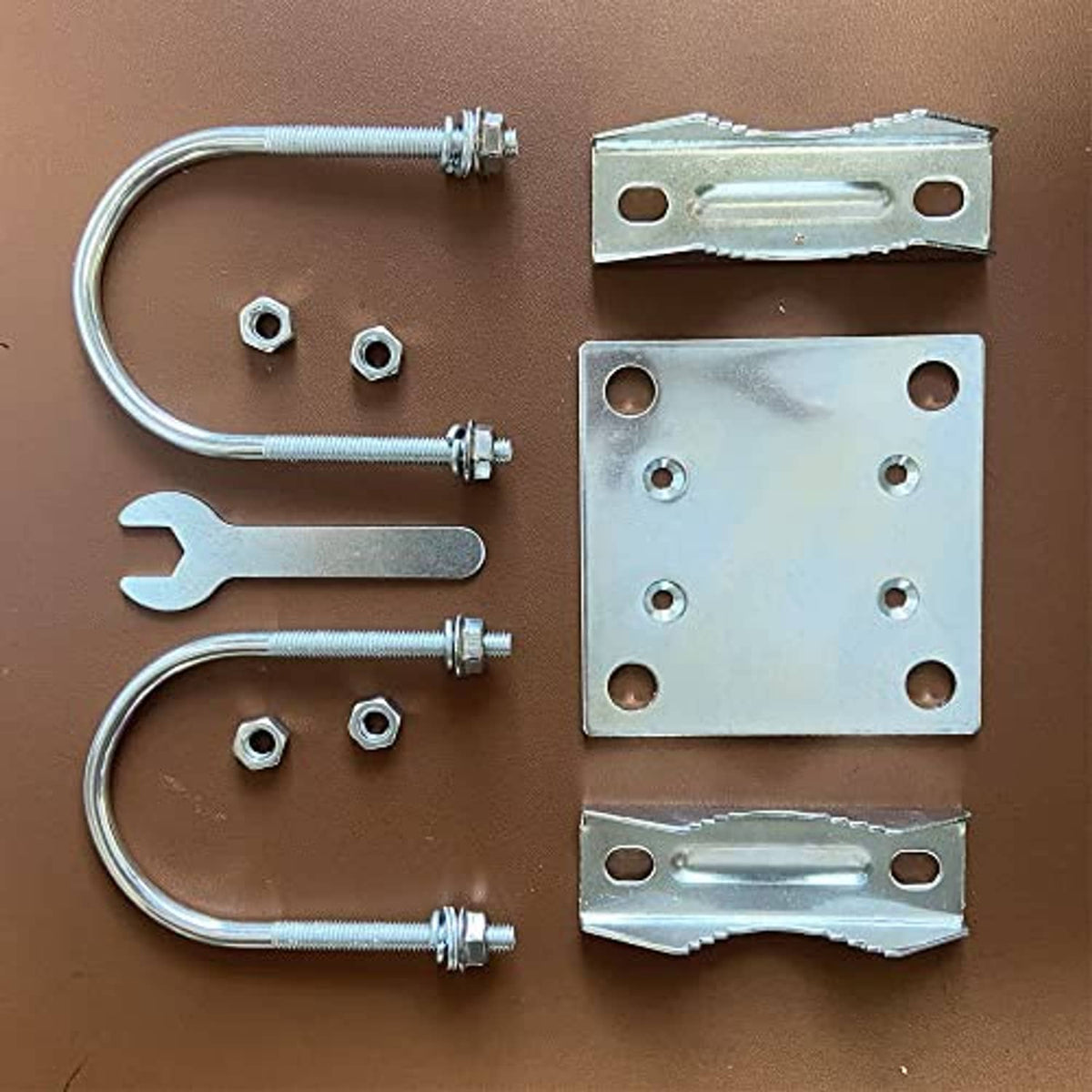Starlink mounting kit parts: U-bolts, bracket plates, and fastener screws, metal