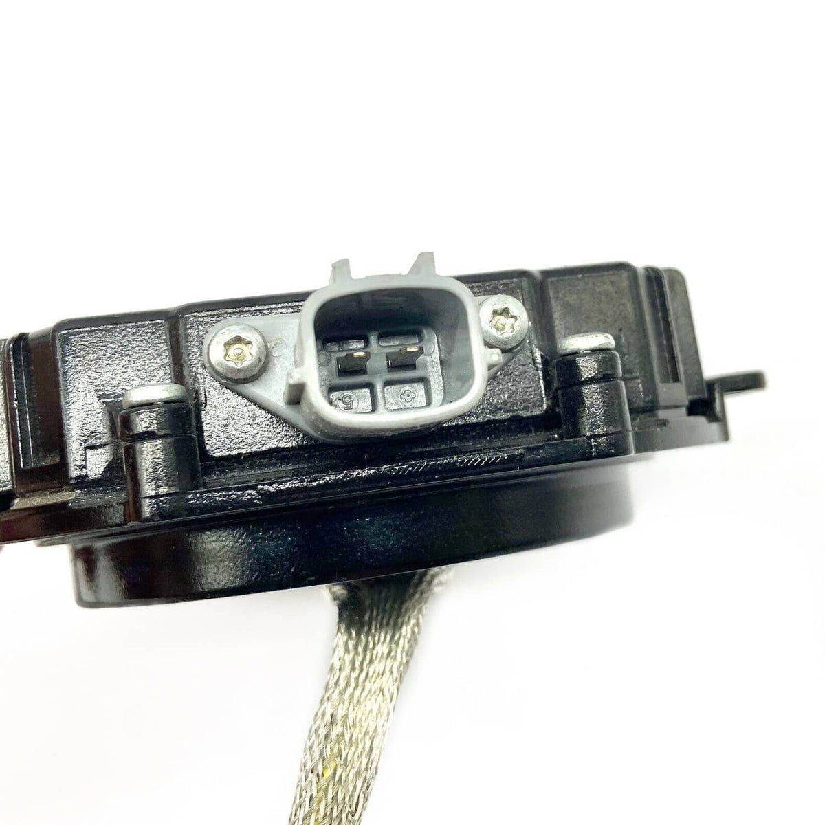 HID xenon control module close-up of electrical connector plug and wiring lead