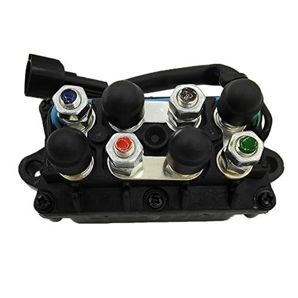 Boat tilt-trim relay module top view with colored terminal caps and screws