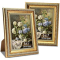 Ornate 5x7 gold picture frame with textured border and clear front glass
