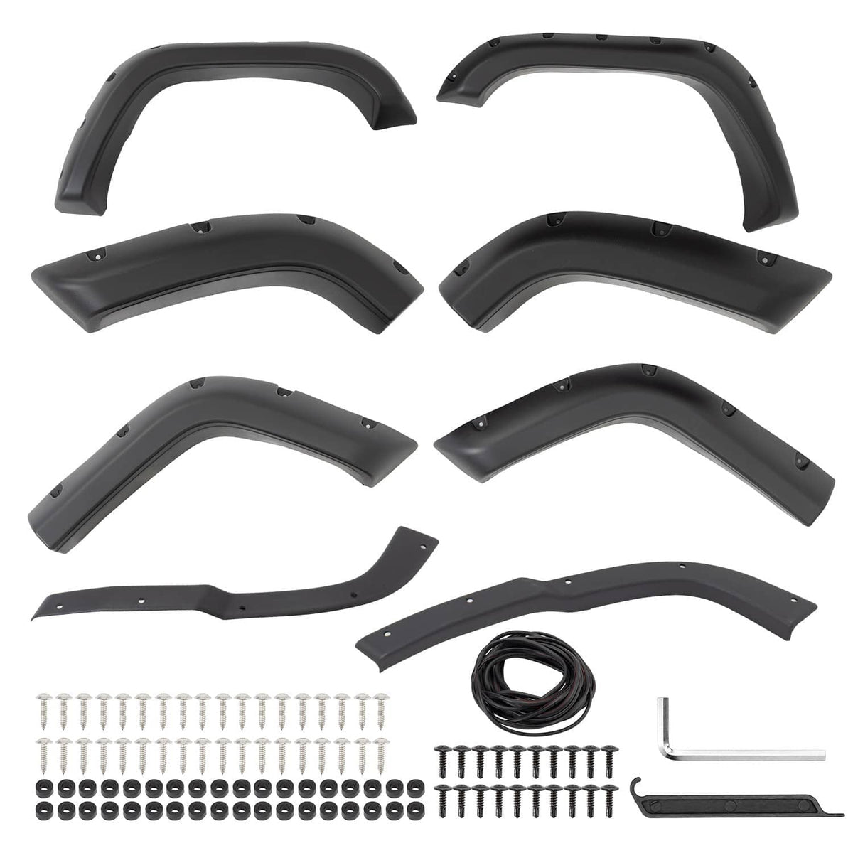 Black fender flare set laid out with screws, clips, and mounting hardware